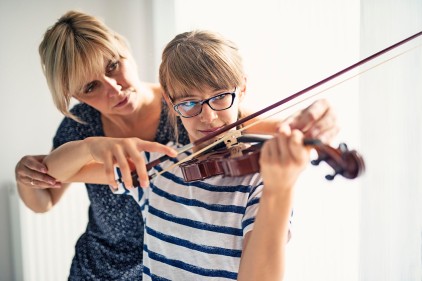 Teenage girl violin lesson